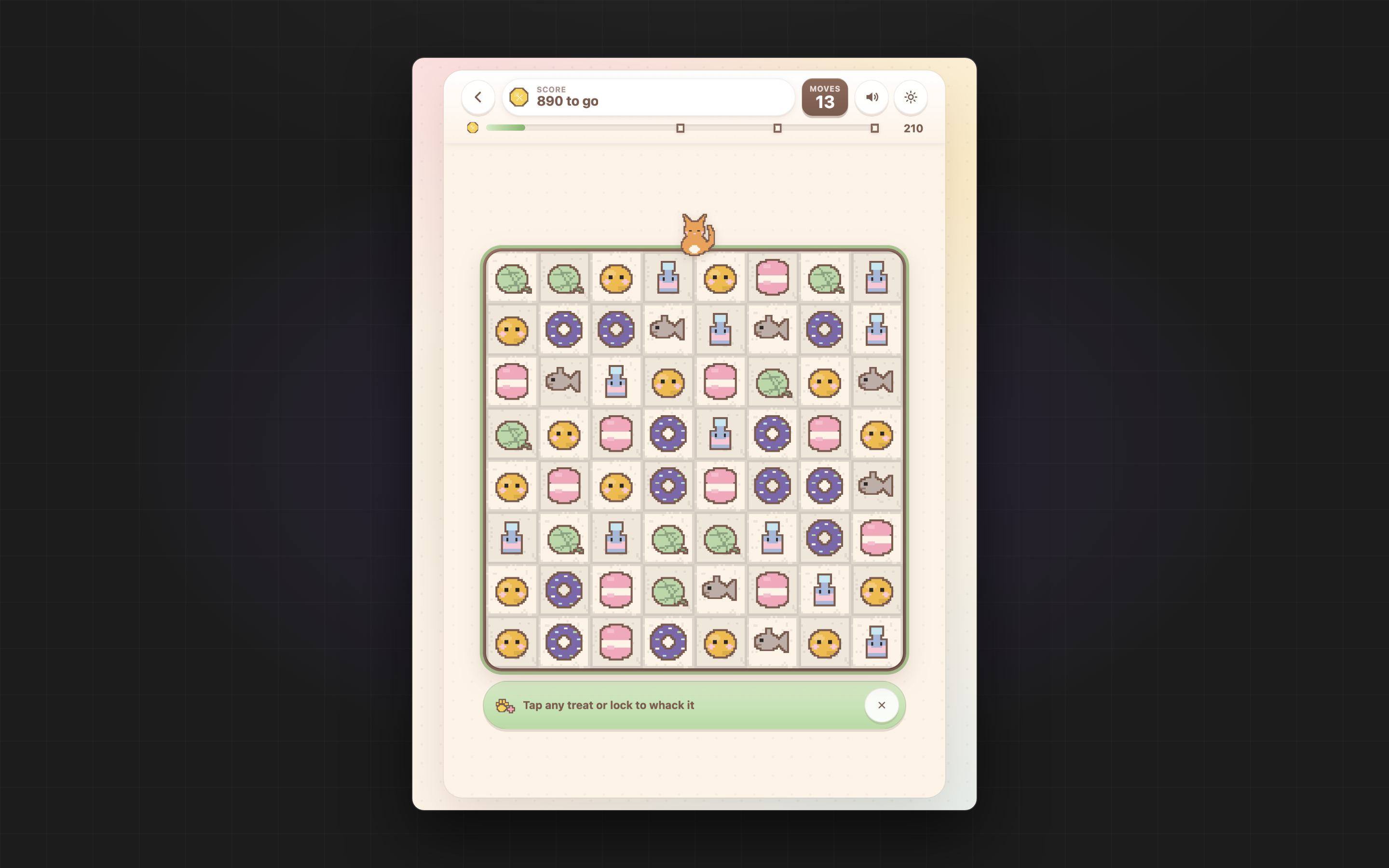 Mewsli with the Paw Whack booster armed: a green border round the board and a prompt to tap any treat to clear it